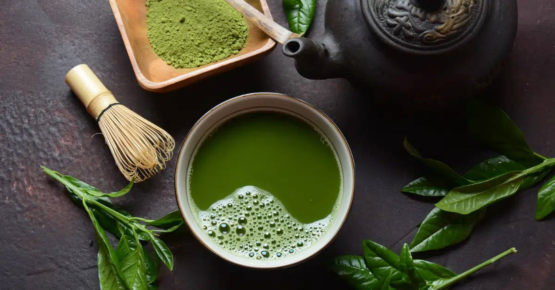 Green matcha tea drink and tea accessories